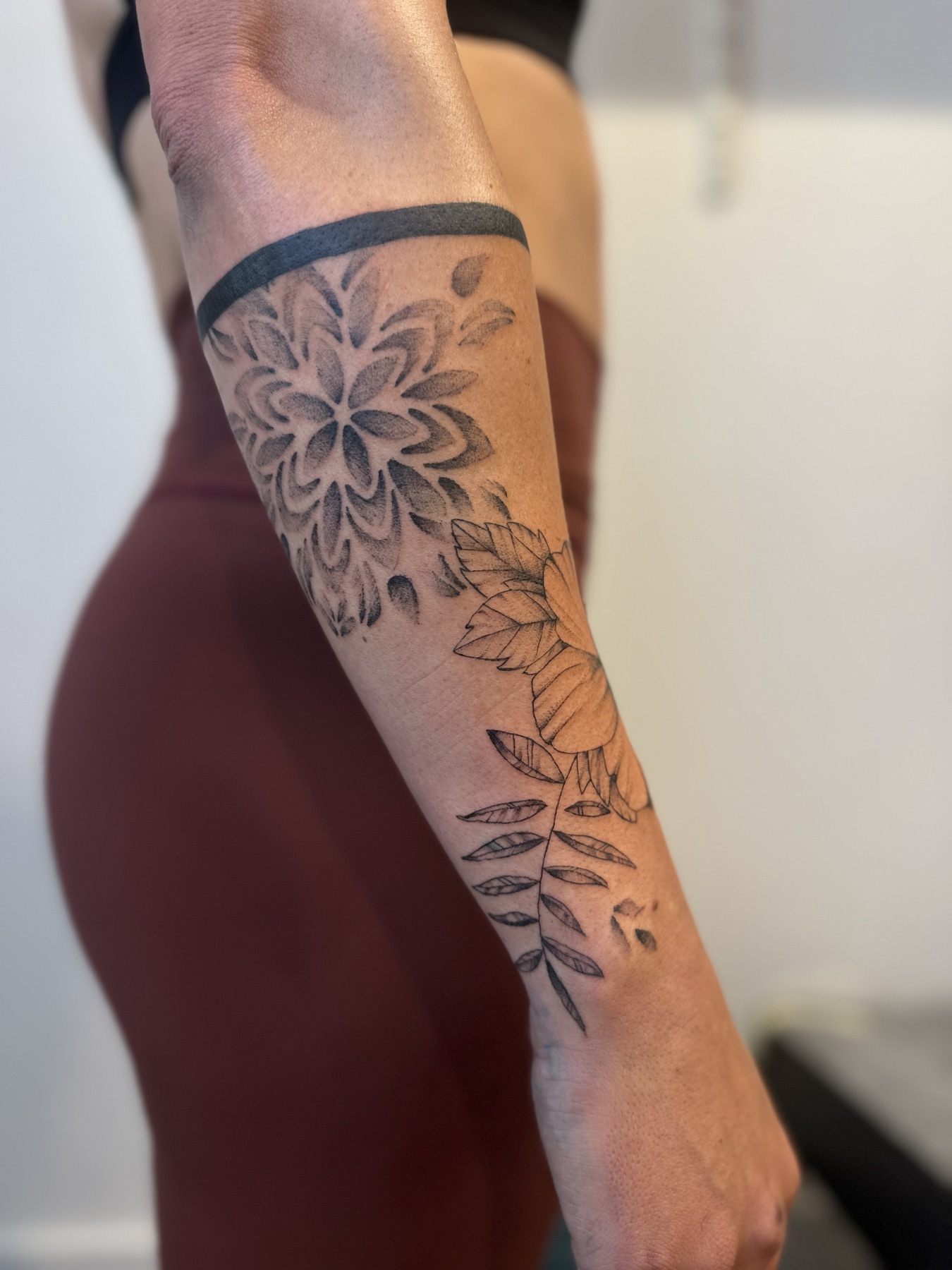 Botanical forearm tattoo
