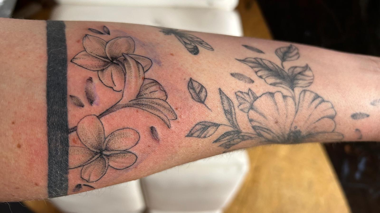 Framed botanical tattoo